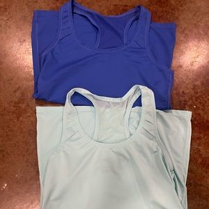 Women’s medium Columbia shirts. 2 shirts total